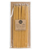 Package of 12 tall hand-dipped beeswax birthday candles in a natural pale yellow color.