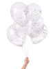Bunch of clear balloons filled with white and iridescent confetti